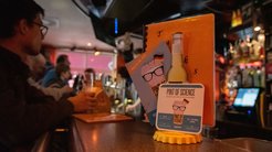 Flyers and beer mats from Pint of Science in Cologne pub.